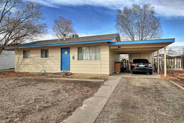 a car parked in front of house