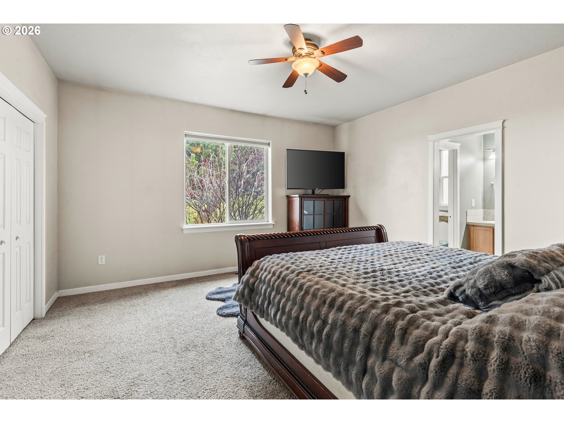 77286 Joyce Way Echo, OR 97826 - Photo 19 of 41 a bedroom with a large bed and a window