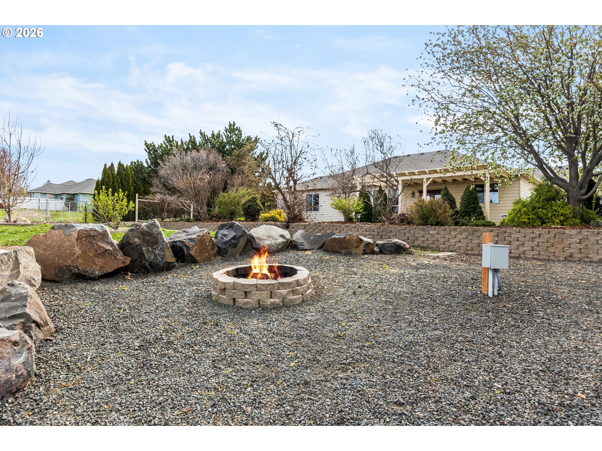 77286 Joyce Way Echo, OR 97826 - Photo 36 of 41 a front view of a house with garden and parking