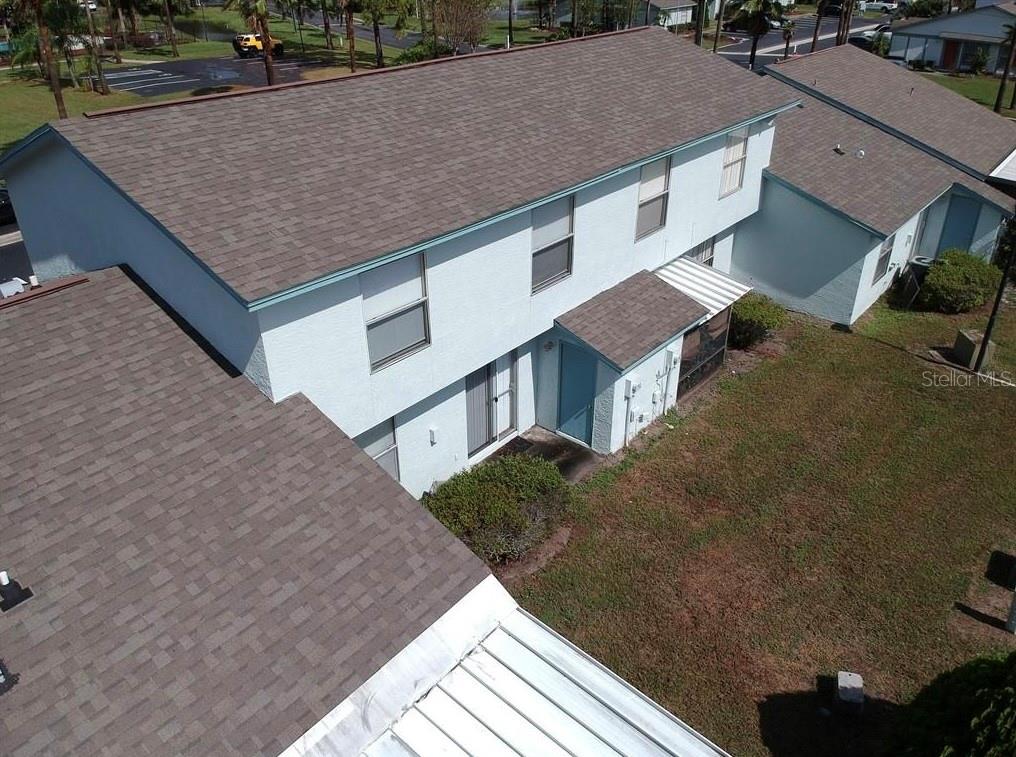 3216 Hempstead Avenue Kissimmee, FL 34741 - Photo 11 of 13 a aerial view of a house with a yard