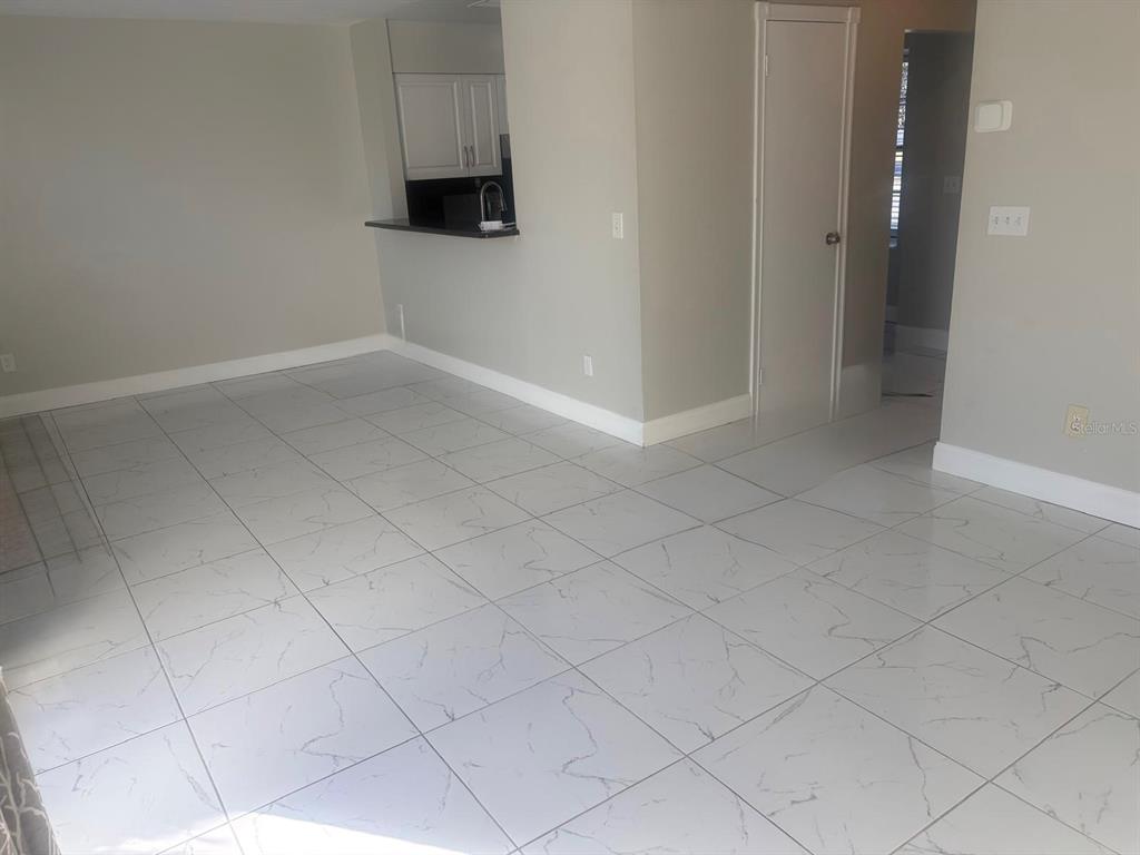 3216 Hempstead Avenue Kissimmee, FL 34741 - Photo 3 of 13 a view of an empty room