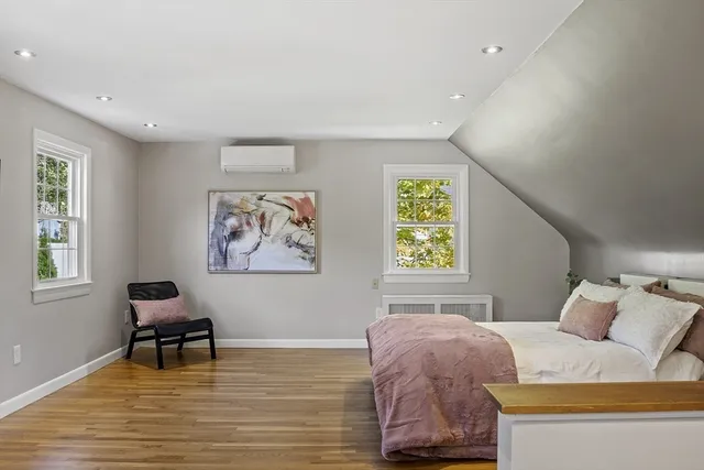 a bathroom with a shower a toilet and sink