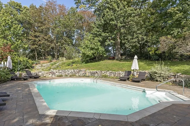 a view of a house with swimming pool