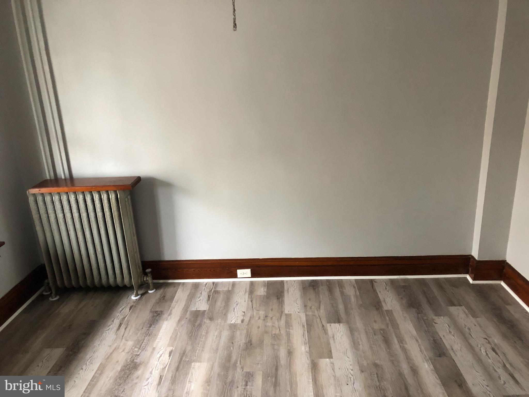 607 Guilford Street, Unit 2 Lebanon, PA 17046 - Photo 5 of 9 a view of wooden floor with entryway in front of door