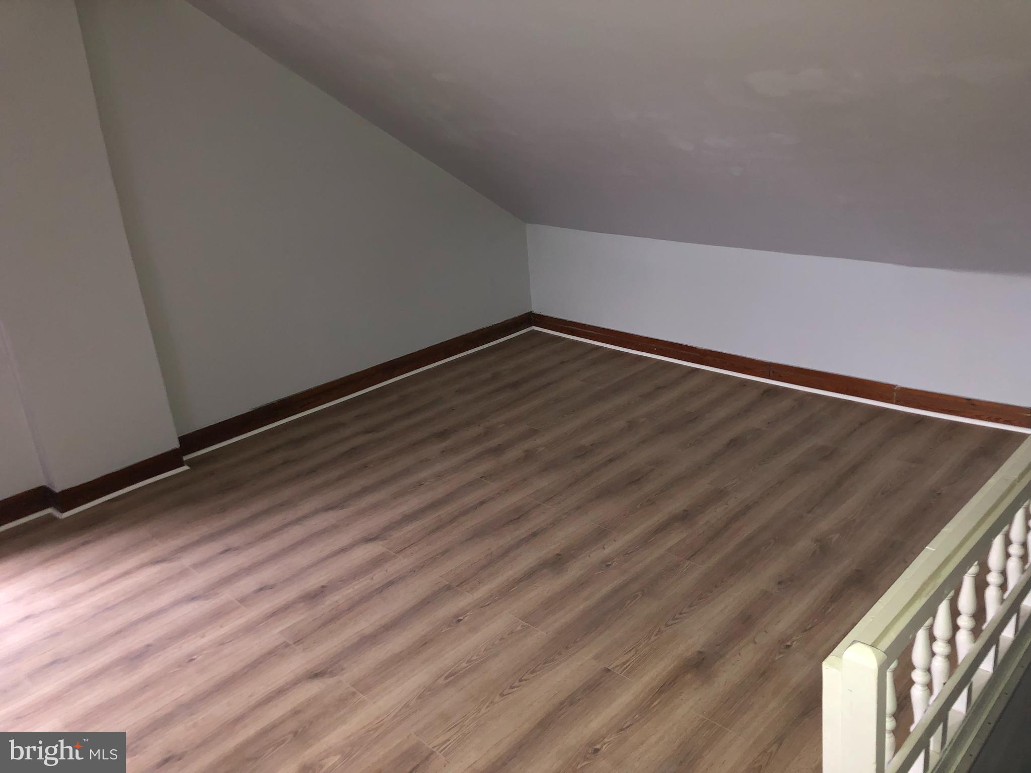 607 Guilford Street, Unit 2 Lebanon, PA 17046 - Photo 7 of 9 a view of a room with wooden floor