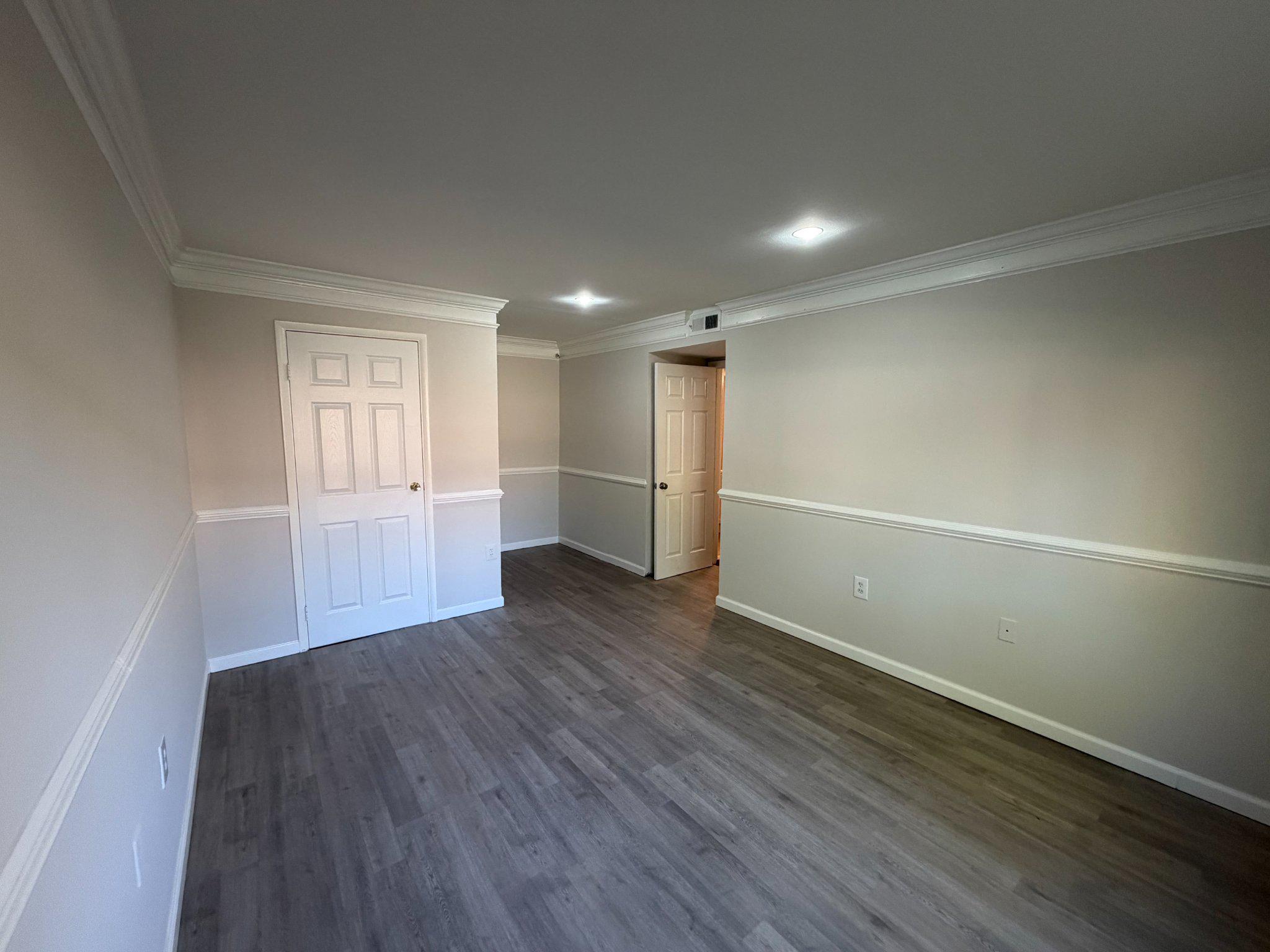 3732 Bel Pre Road, Unit 2 Silver Spring, MD 20906 - Photo 13 of 21 a view of empty room with wooden floor and window