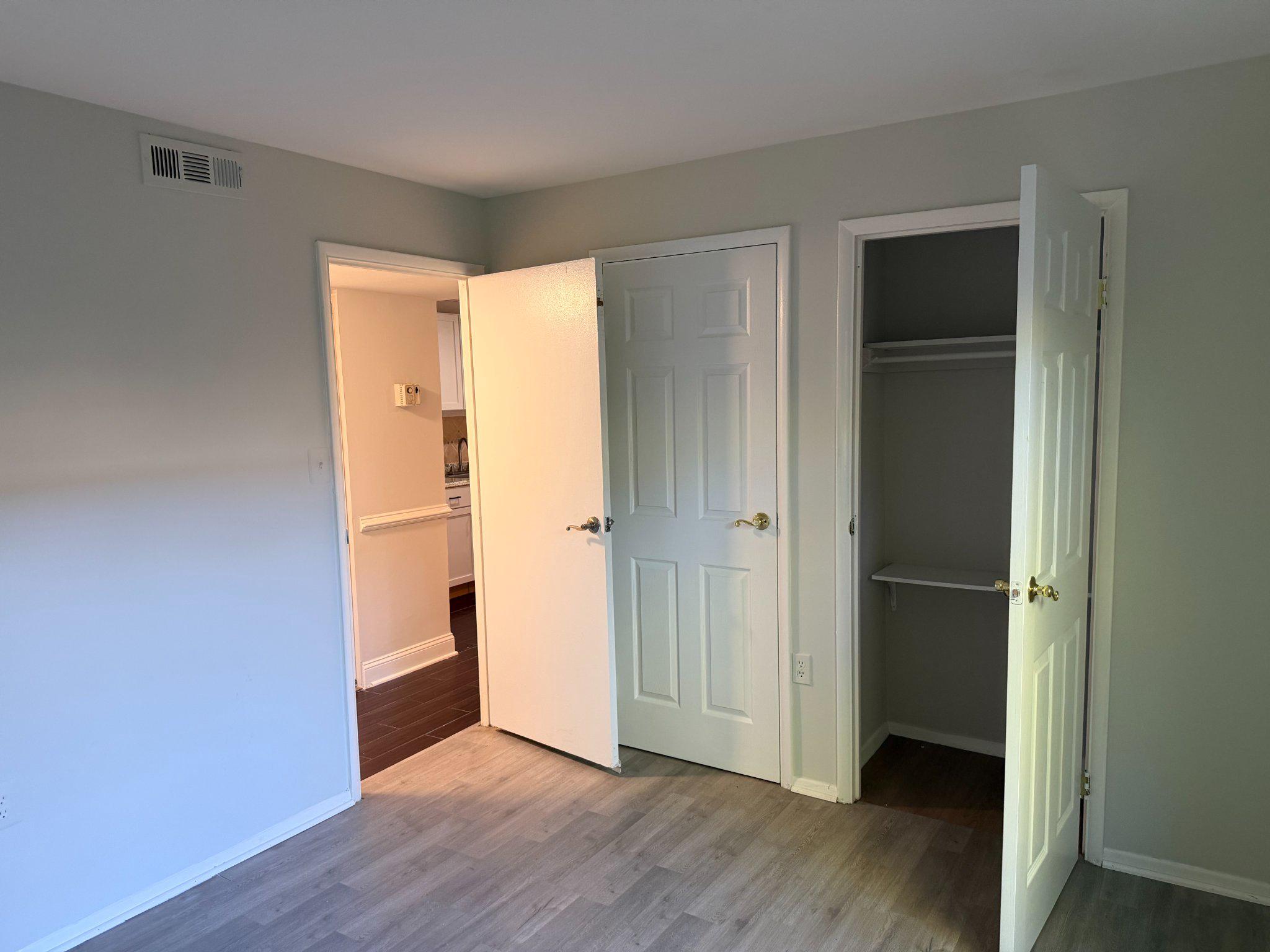 3732 Bel Pre Road, Unit 2 Silver Spring, MD 20906 - Photo 18 of 21 a view of an empty room with wooden floor