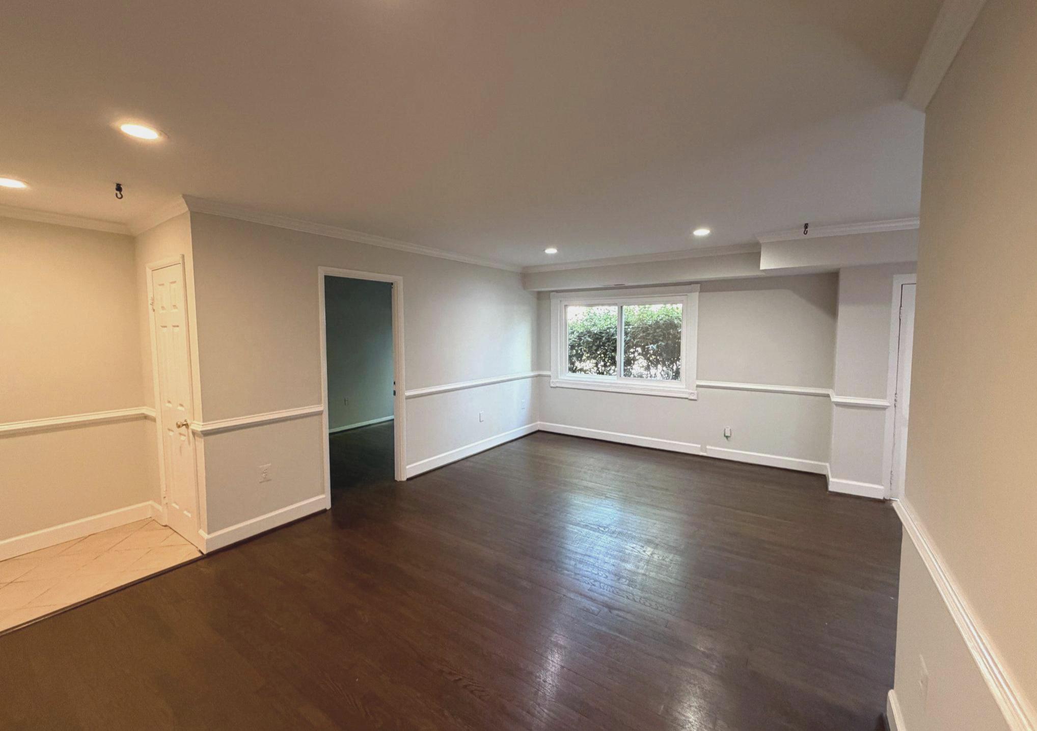 3732 Bel Pre Road, Unit 2 Silver Spring, MD 20906 - Photo 2 of 21 wooden floor in an empty room with a window