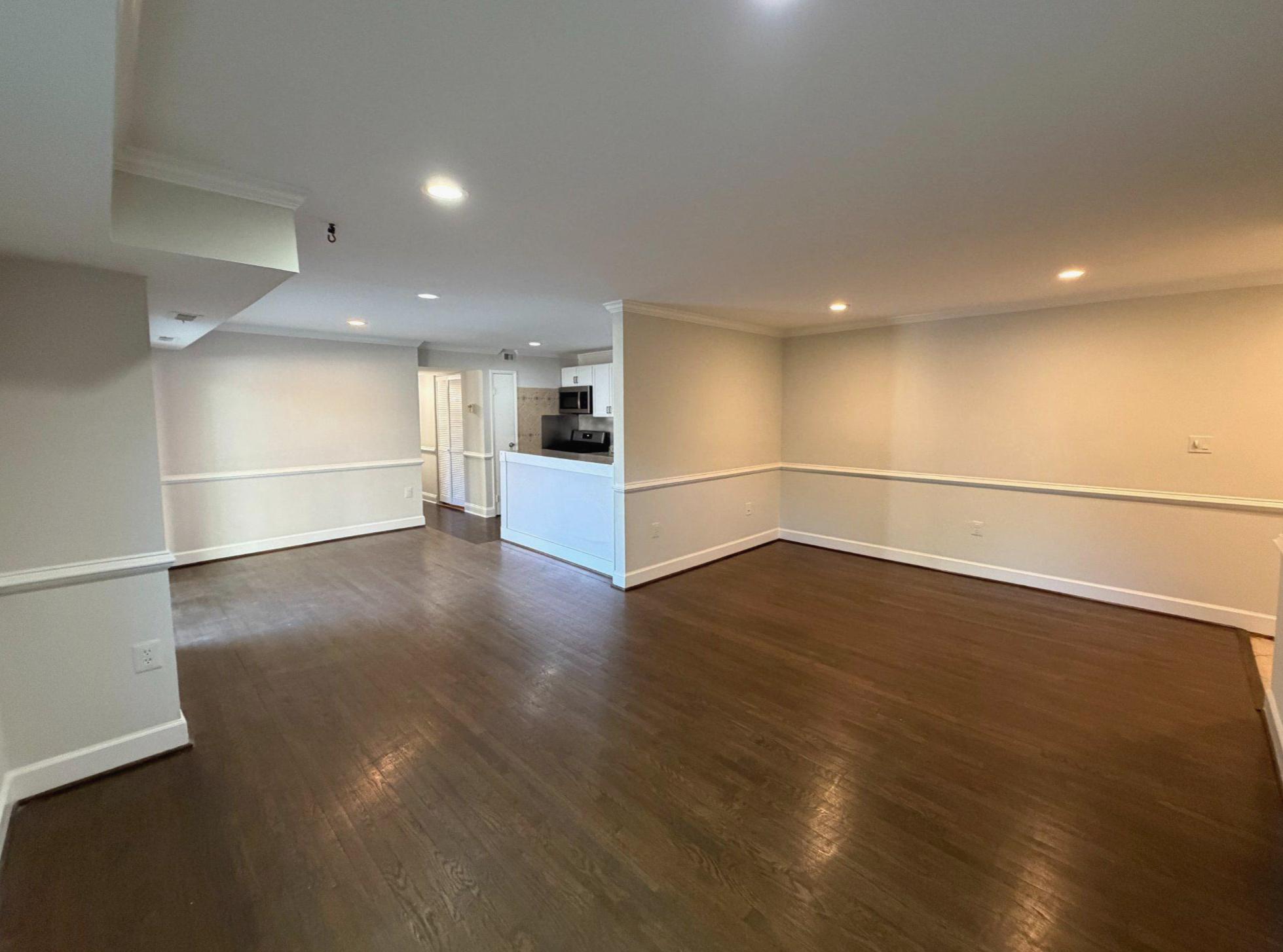 3732 Bel Pre Road, Unit 2 Silver Spring, MD 20906 - Photo 5 of 21 an empty room with wooden floor and natural light