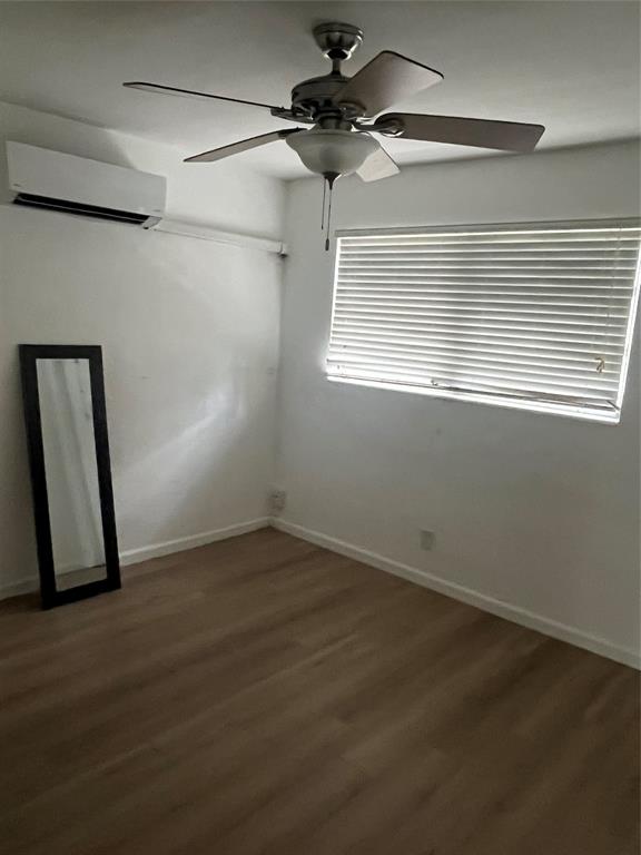 113 Southeast 12th Avenue, Unit 2 Pompano Beach, FL 33060 - Photo 4 of 7 a view of an empty room with a window