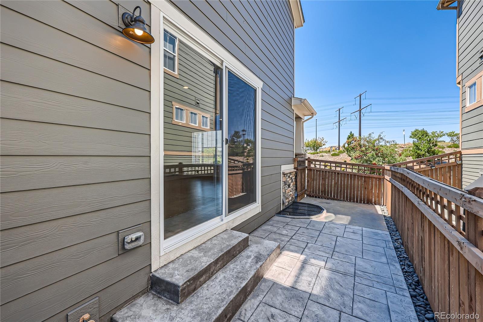 7199 Othello Street Castle Pines, CO 80108 - Photo 26 of 28 a view of a balcony with door