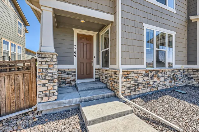 front view of a house with an outdoor space