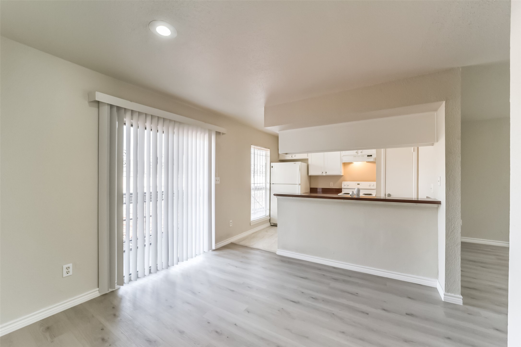 6202 Skyline Drive, Unit 44 Houston, TX 77057 - Photo 13 of 29 a view of kitchen and wooden floor
