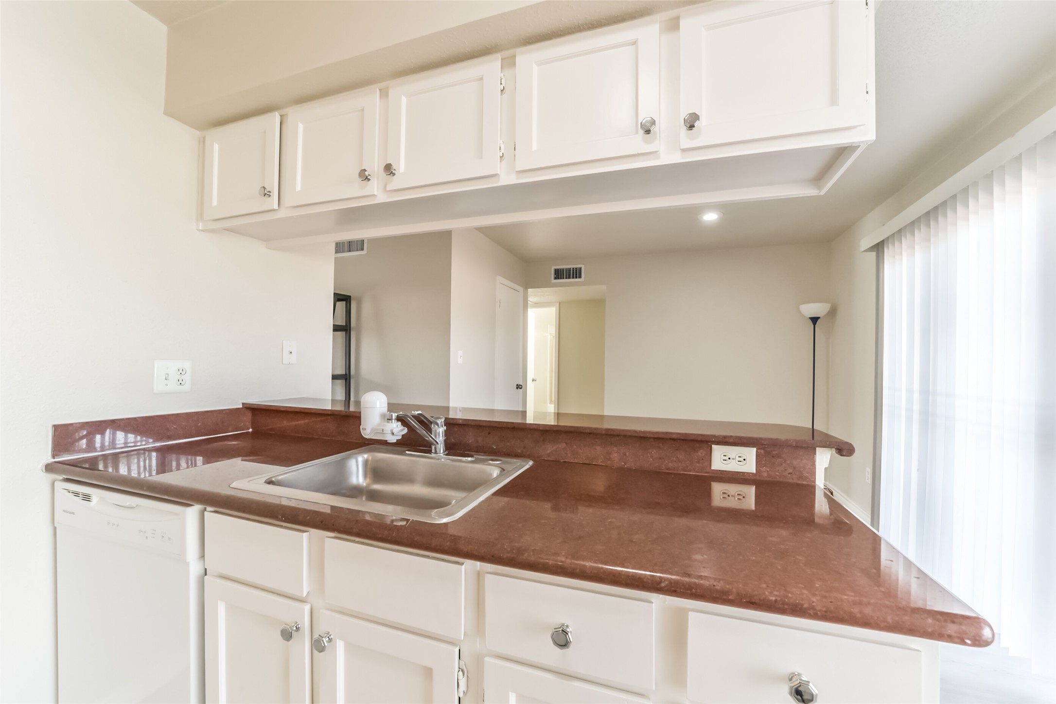 6202 Skyline Drive, Unit 44 Houston, TX 77057 - Photo 2 of 29 a bathroom with a sink and a mirror