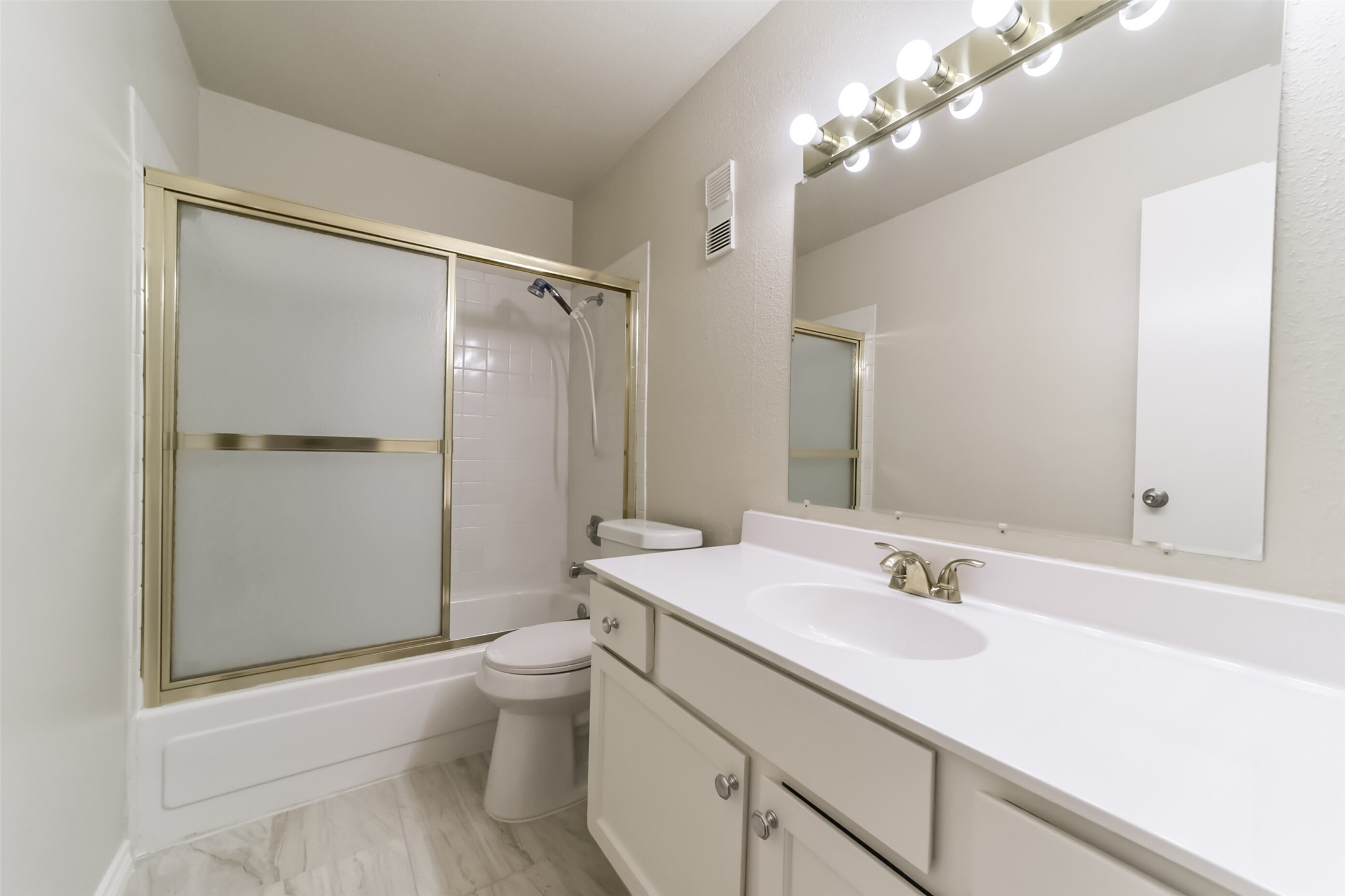 6202 Skyline Drive, Unit 44 Houston, TX 77057 - Photo 21 of 29 a bathroom with a sink a toilet and shower