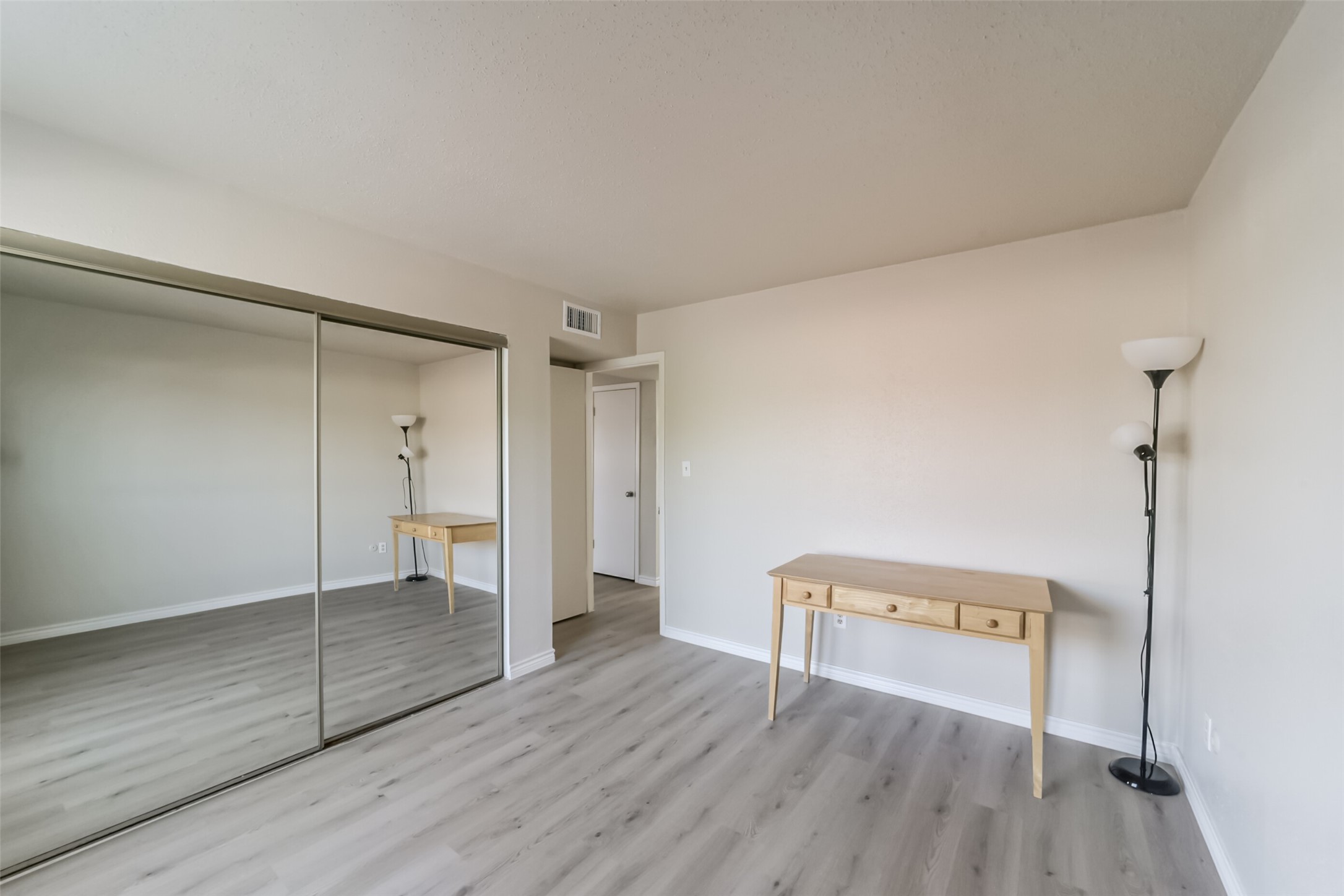 6202 Skyline Drive, Unit 44 Houston, TX 77057 - Photo 23 of 29 a view of a room with wooden floor