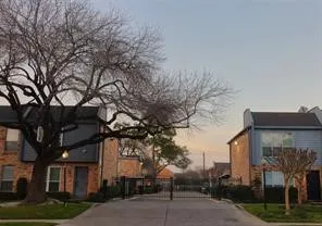 front view of a house with a trees