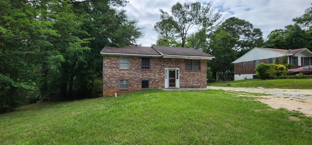 4122 Conley Drive Conley, GA 30288 - Photo 1 of 1 a view of a house with a yard