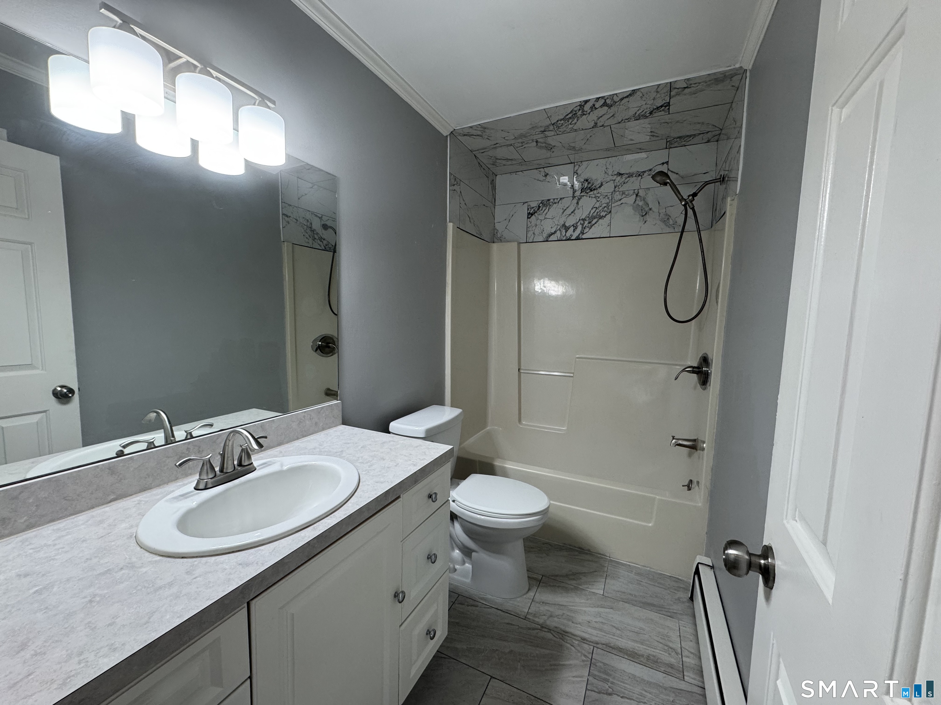 27 Katie Lane Waterbury, CT 06708 - Photo 6 of 14 a bathroom with a sink toilet and shower