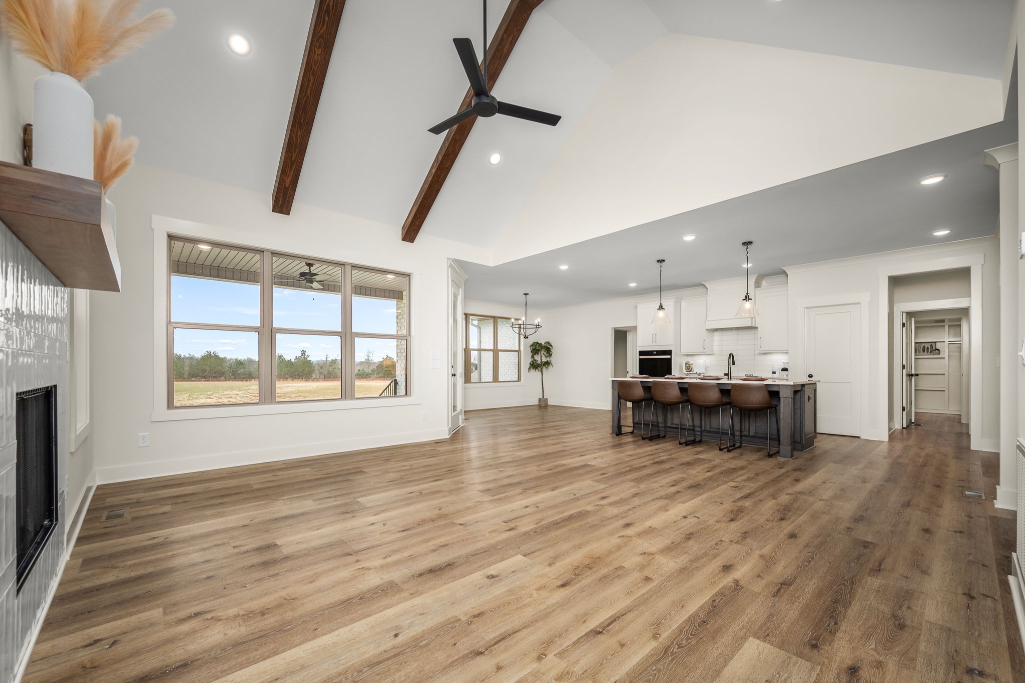 7314 West Gum Road Murfreesboro, TN 37127 - Photo 13 of 49 a view of a livingroom with furniture flat screen tv and windows