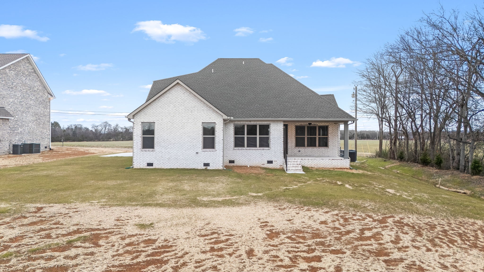 7314 West Gum Road Murfreesboro, TN 37127 - Photo 44 of 49 a front view of a house with a yard
