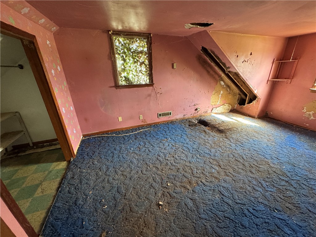 5839 Shaker Road Franklin, OH 45005 - Photo 18 of 18 This interior space features carpet flooring, creating a cozy and inviting atmosphere.