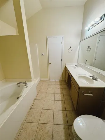 a bathroom with a sink a toilet and a bathtub