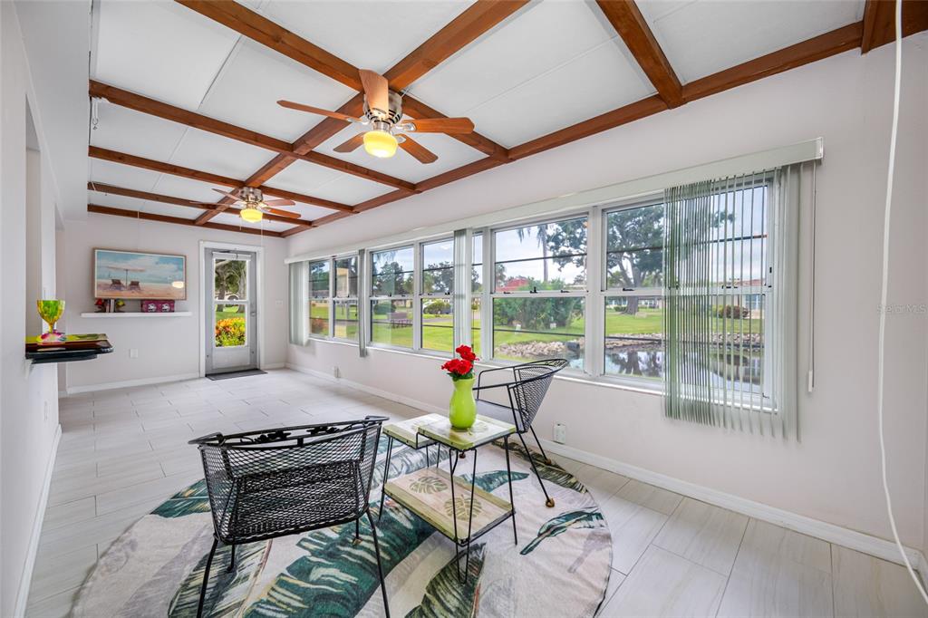 12200 Vonn Road, Unit 8A Largo, FL 33774 - Photo 22 of 41 a living room filled with furniture and a table