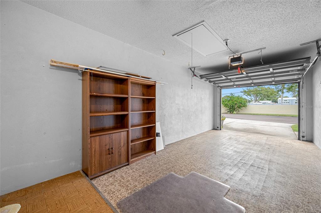 12200 Vonn Road, Unit 8A Largo, FL 33774 - Photo 31 of 41 a view of walk in closet with empty racks