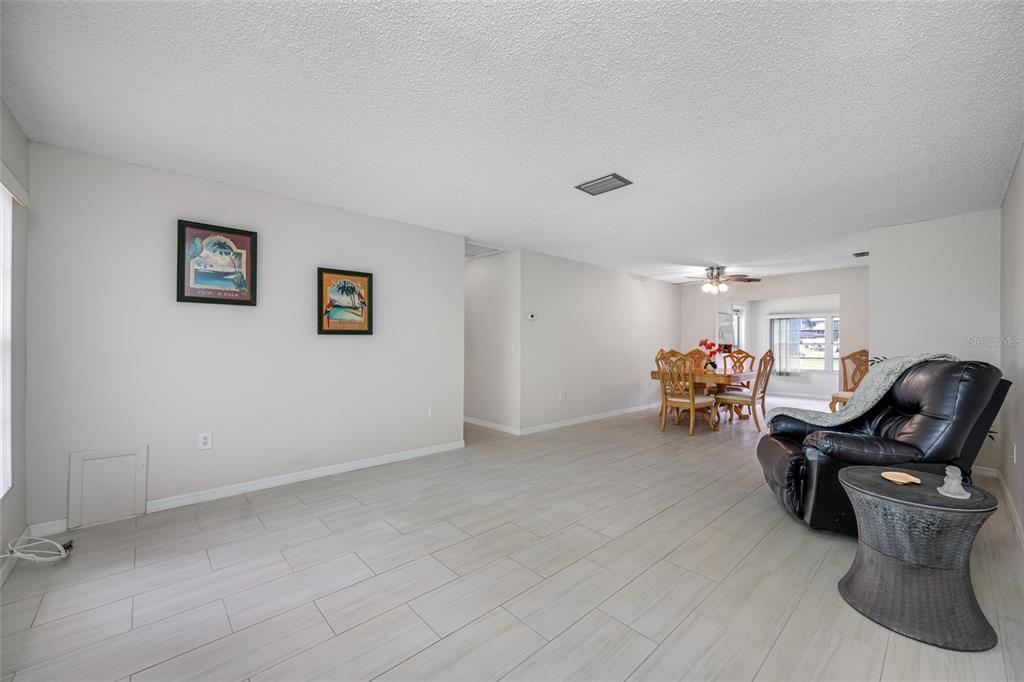 12200 Vonn Road, Unit 8A Largo, FL 33774 - Photo 9 of 41 a living room with furniture