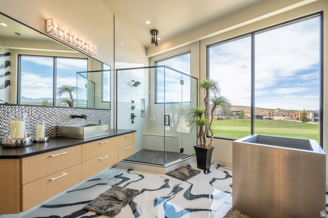 3606 South Cypress Road Hurricane, UT 84737 - Photo 31 of 69 Full bath with a stall shower, vanity, healthy amount of natural light, tasteful backsplash, and recessed lighting