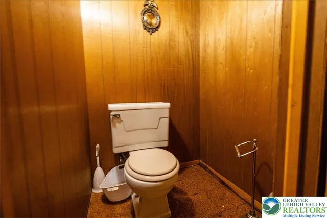 a bathroom with a toilet and a sink
