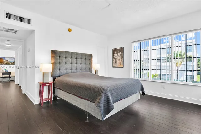a bathroom with a sink vanity and a mirror