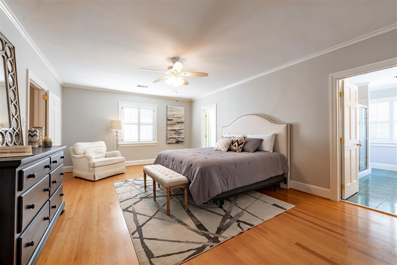 1110 Harvey Street Raleigh, NC 27608 - Photo 11 of 30 Master bedroom has a large walk-in closet and luxurious master bathroom with large shower and separate tub. Master Bedroom