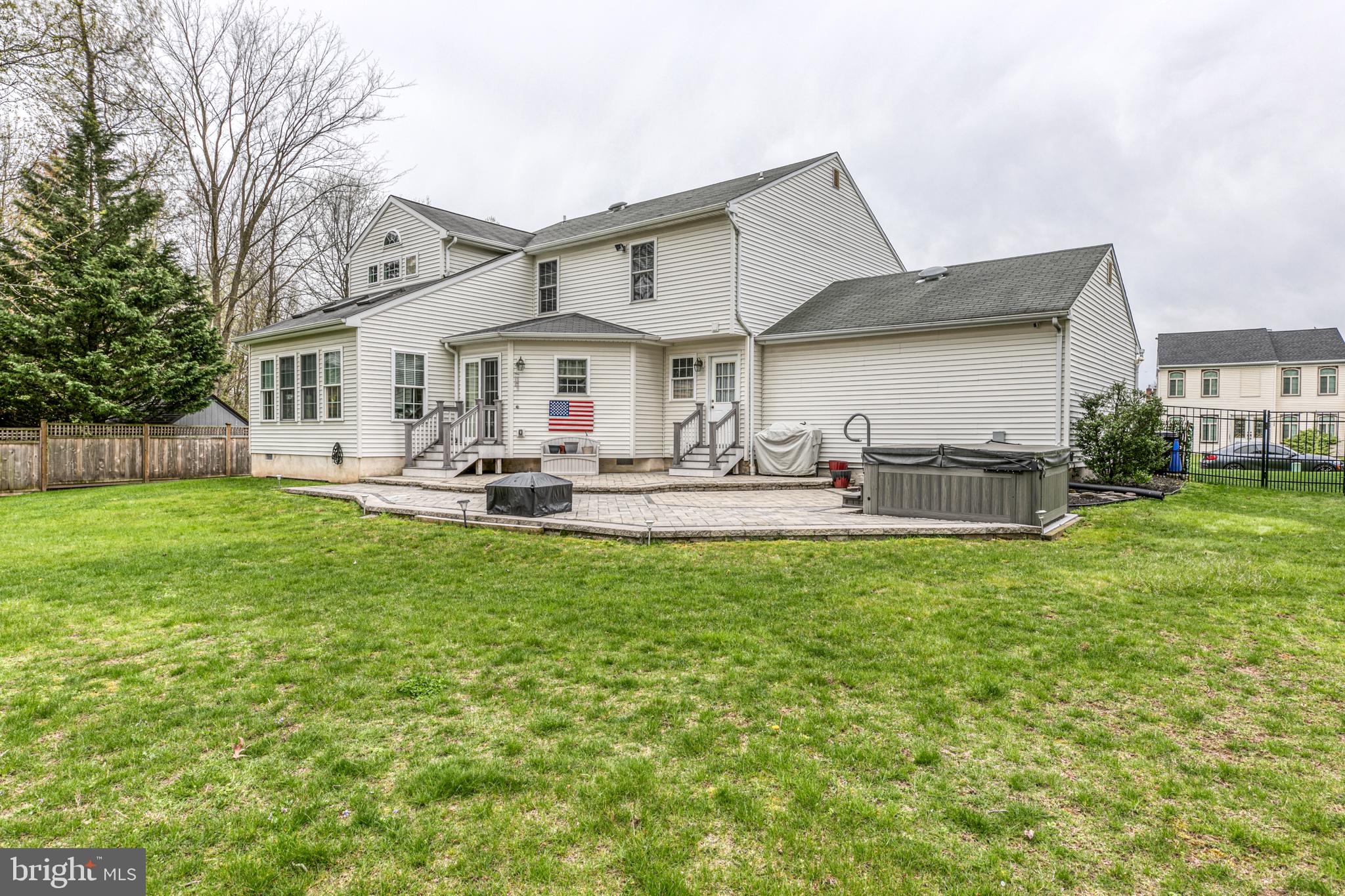 148 Flint Road Langhorne, PA 19047 - Photo 36 of 39 Custom tiered paver patio with hot tub