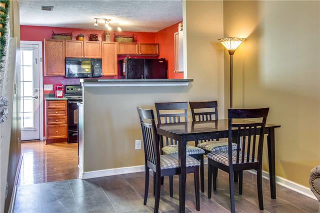 424 Creekside Lane Spring Hill, TN 37174 - Photo 4 of 20 The Dining Room is Adjacent to the Kitchen and Living Room.