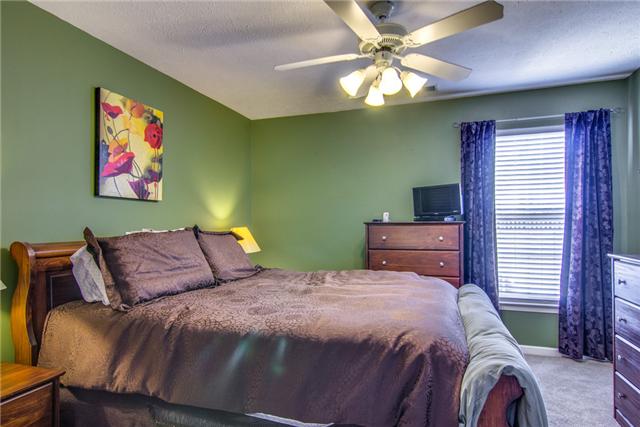 424 Creekside Lane Spring Hill, TN 37174 - Photo 7 of 20 This Private Master Bedroom Suite has a Ceiling Fan and Bright Ceiling Fan and is Tucked Away from the Rest of the Home