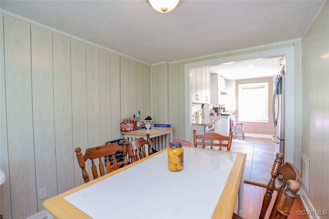 10432 Verdon Road Doswell, VA 23047 - Photo 12 of 30 a view of a dining room with furniture and a table