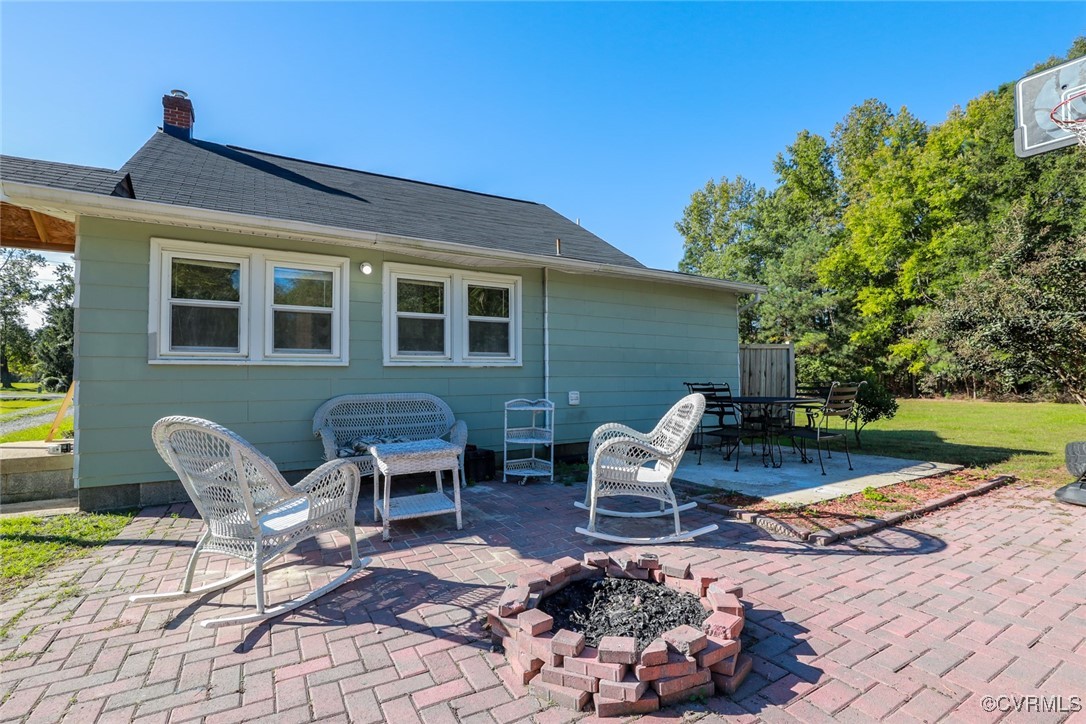10432 Verdon Road Doswell, VA 23047 - Photo 22 of 30 a view of a patio with table and chairs and potted plants