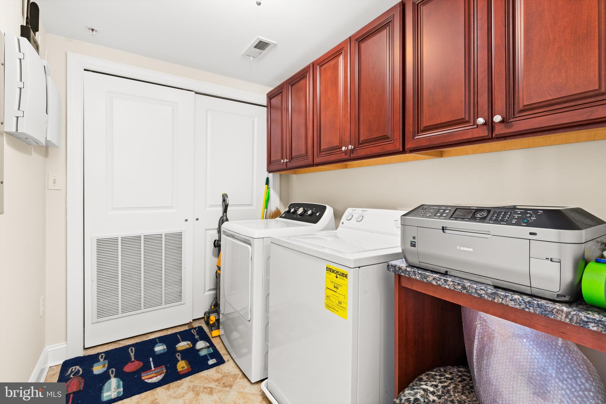 530 Riverside Drive, Unit 202 Salisbury, MD 21801 - Photo 23 of 38 a utility room with dryer and washer