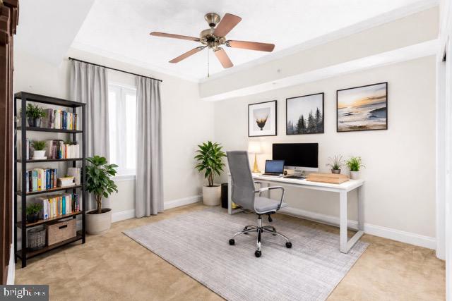 530 Riverside Drive, Unit 202 Salisbury, MD 21801 - Photo 27 of 38 a workspace with furniture and a potted plant