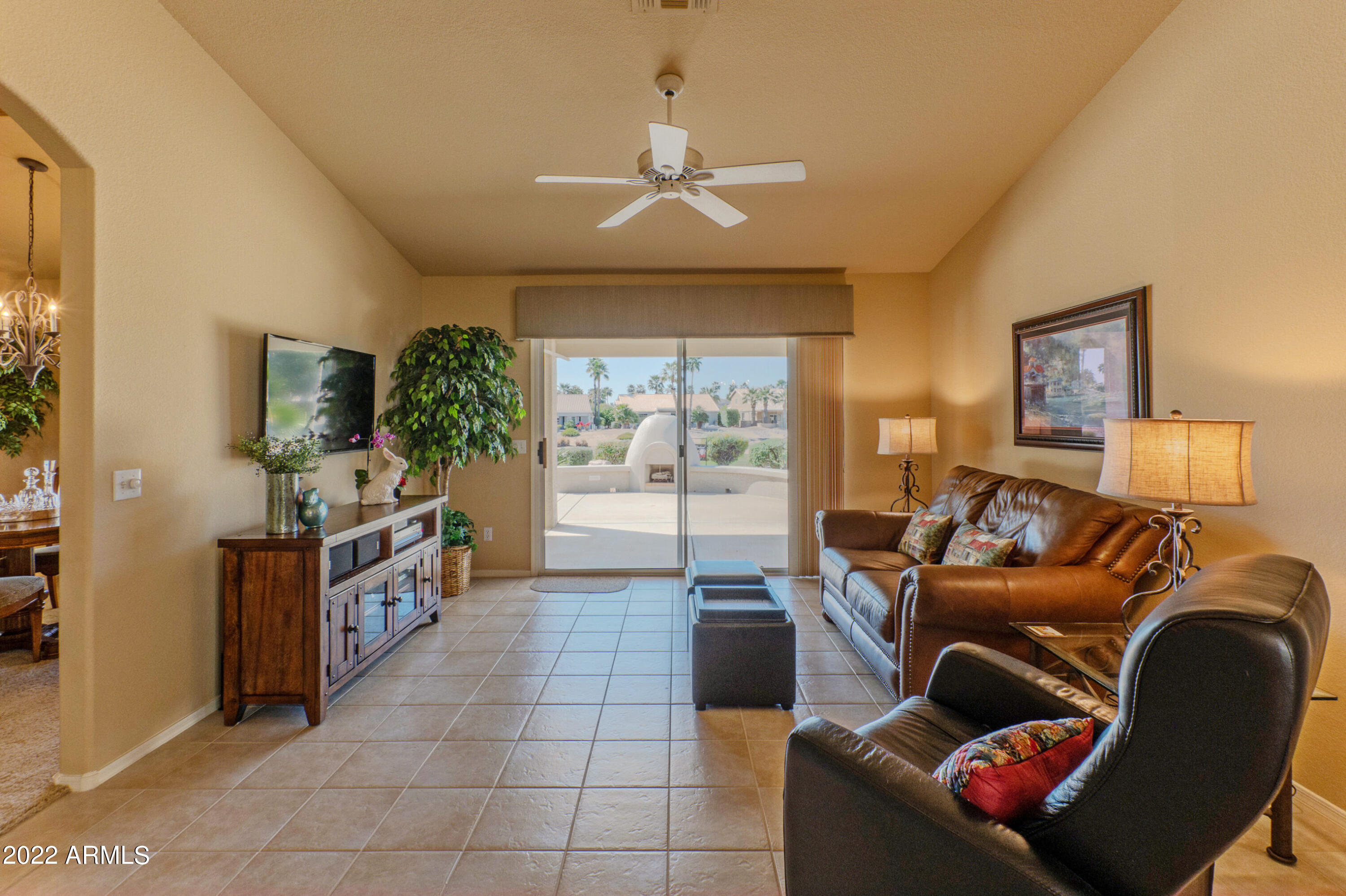 15511 Piccadilly Road Goodyear, AZ 85395 - Photo 13 of 31 Family room with access to patio