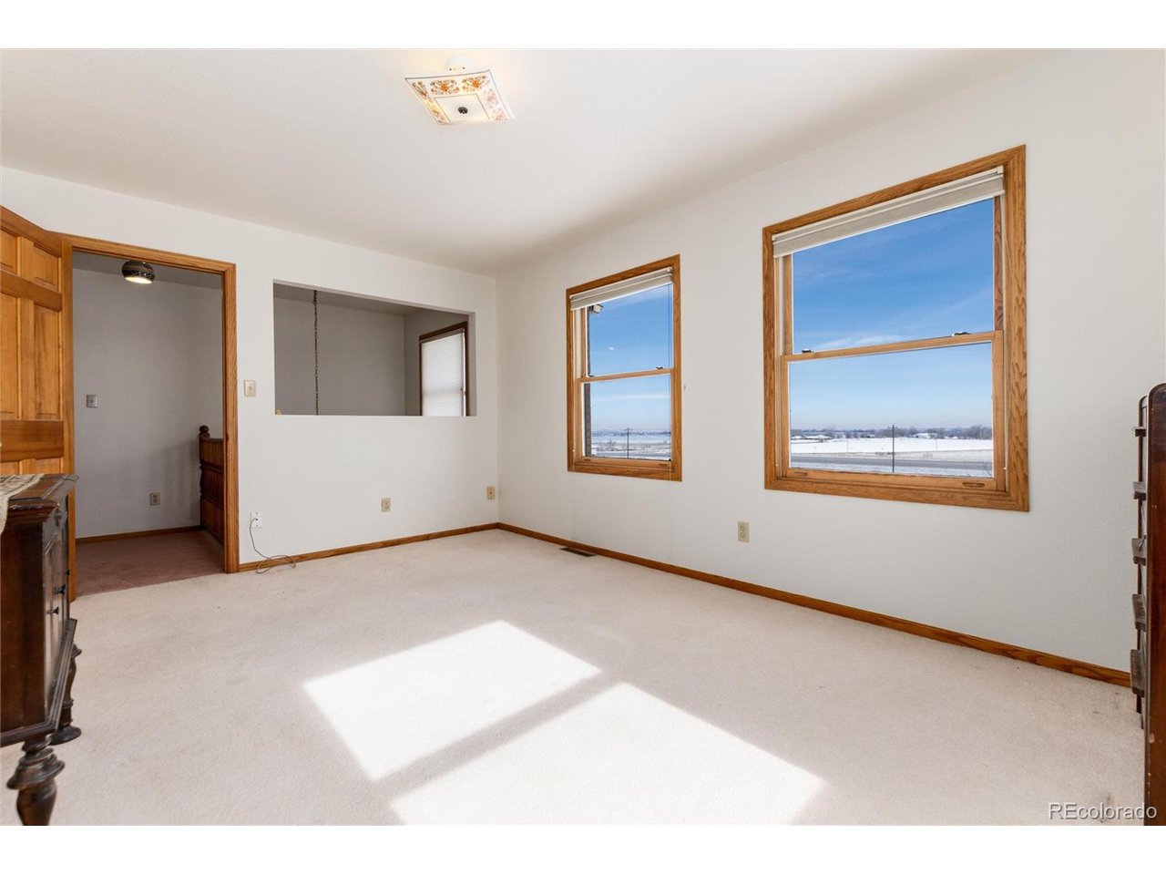 10650 Yellowstone Road Longmont, CO 80504 - Photo 28 of 43 Large windows and open to foyer below.