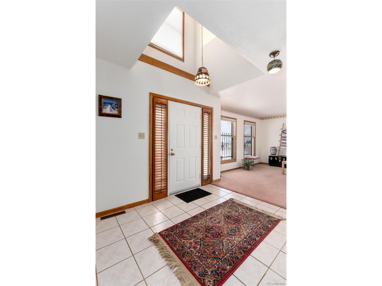 10650 Yellowstone Road Longmont, CO 80504 - Photo 8 of 43 Great light floods the space.