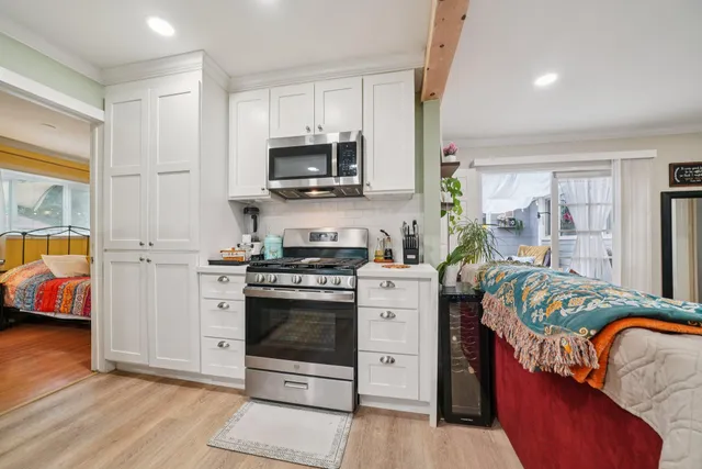 a view of a pathway along the house