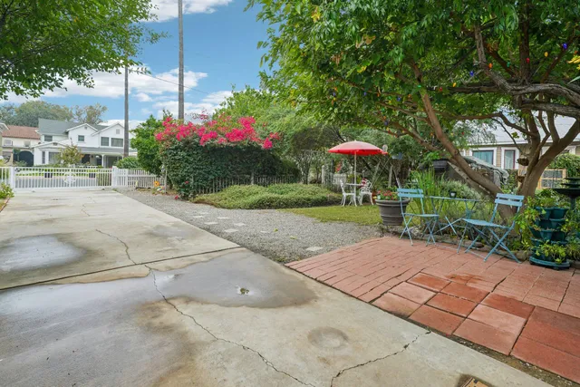a kitchen with stainless steel appliances granite countertop a stove and a refrigerator