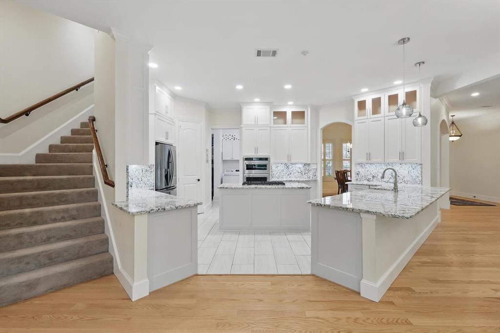 8517 Stallion Street Denton, TX 76208 - Photo 8 of 36 a view of living room with furniture and a wooden floor