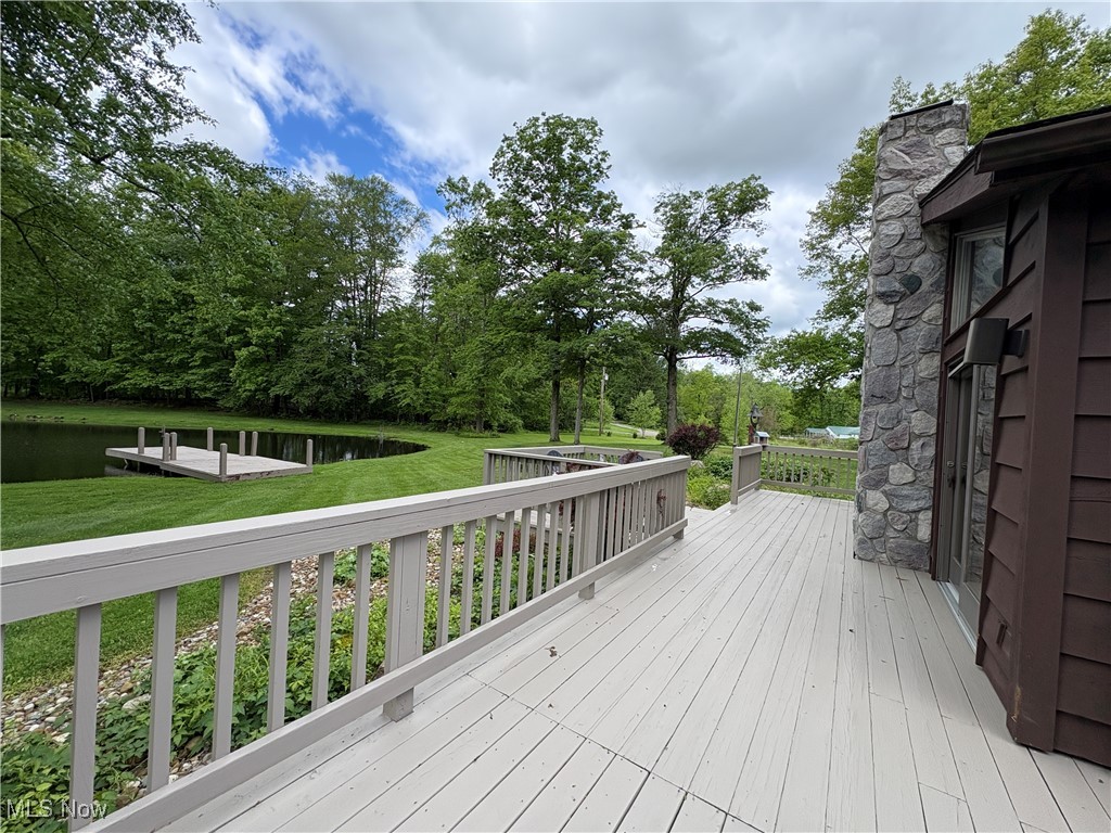 4010 State Road Medina, OH 44256 - Photo 31 of 50 Wooden terrace featuring a water view and a lawn