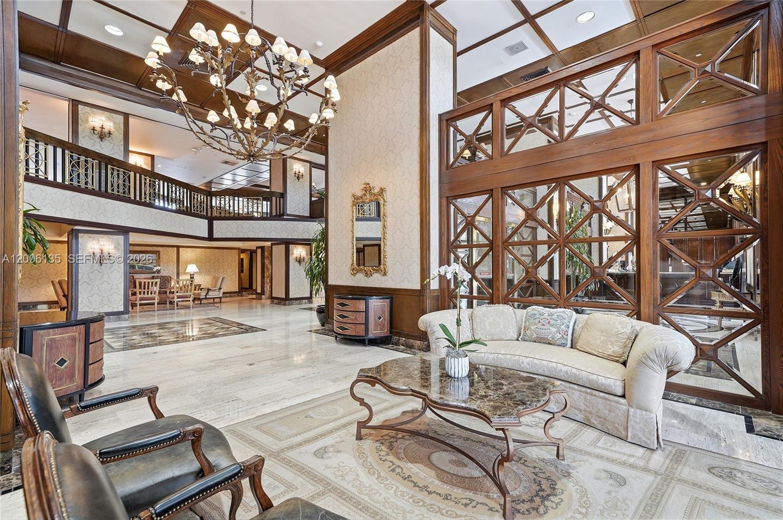 9801 Collins Avenue, Unit 14D Bal Harbour, FL 33154 - Photo 7 of 52 a living room with furniture and a large window