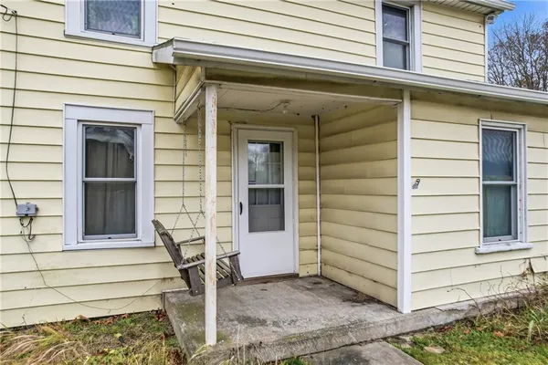 a front view of a house with a window
